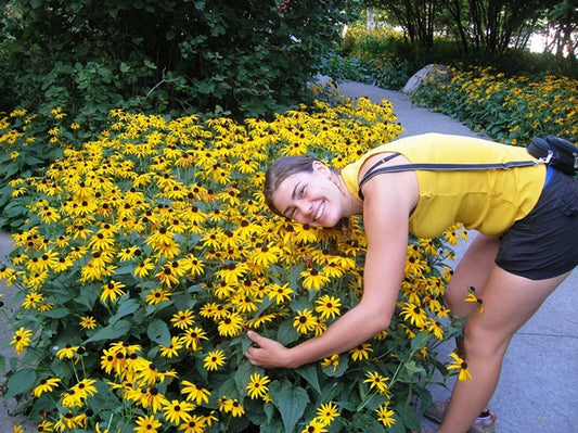 Flower Gal with Black Eyed Susan in the garden